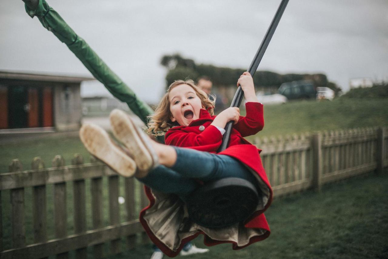 Retallack Resort & Spa Padstow Buitenkant foto A child on a swing